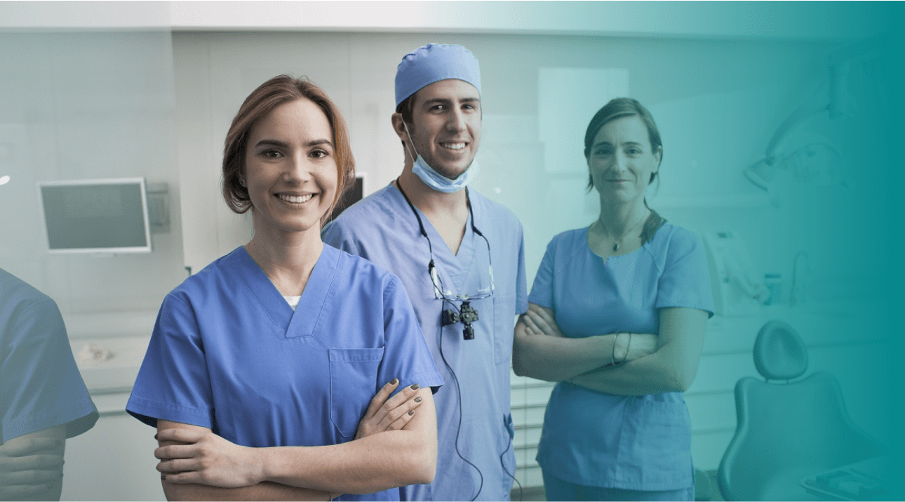 A group of doctors standing in front of a window.